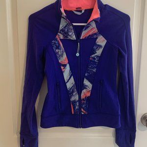 A multicolored "Ivivva" girls jacket.